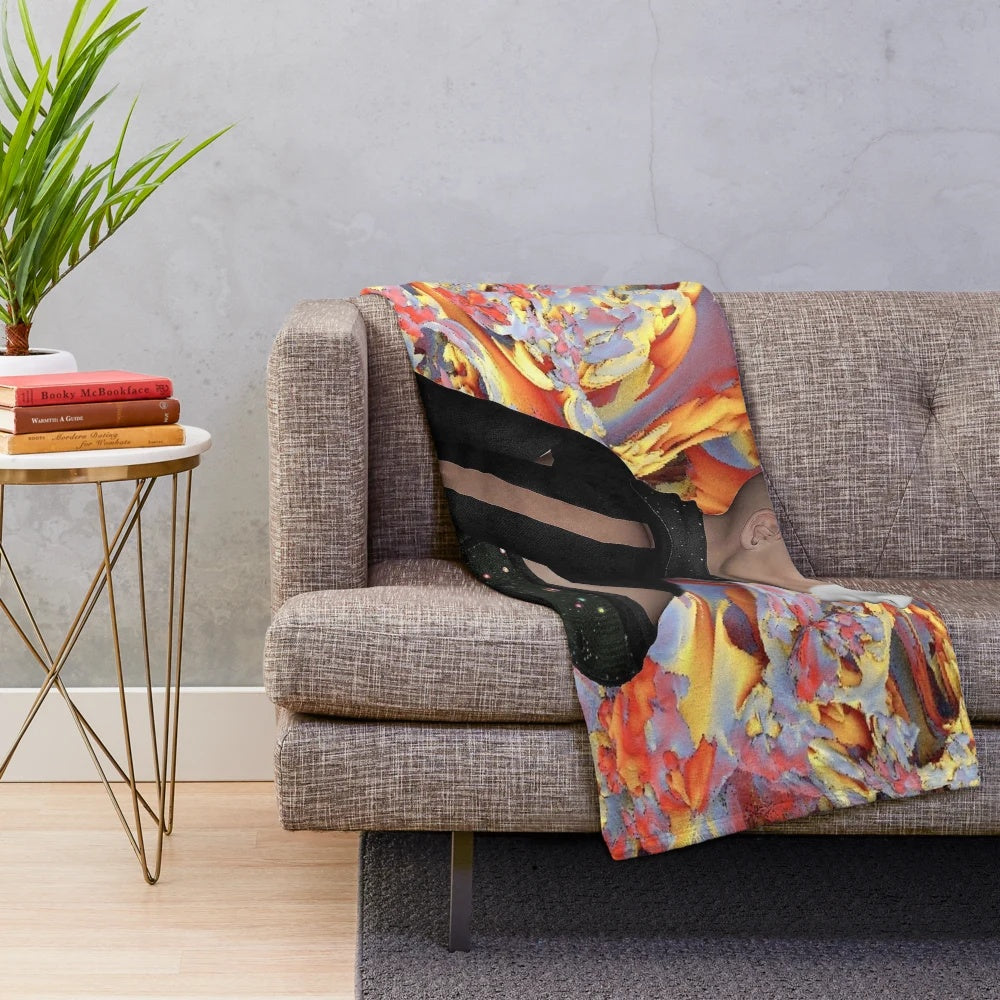 Colorful plush blanket with abstract, nature-inspired patterns