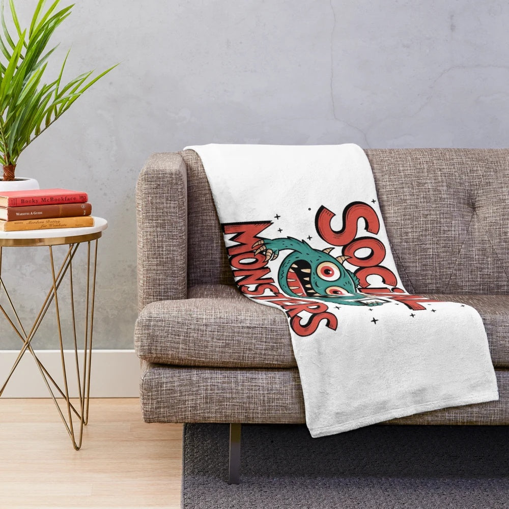 Colorful plush blanket featuring a quirky social media monster design