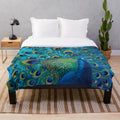 Plush peacock blanket with vibrant feather design