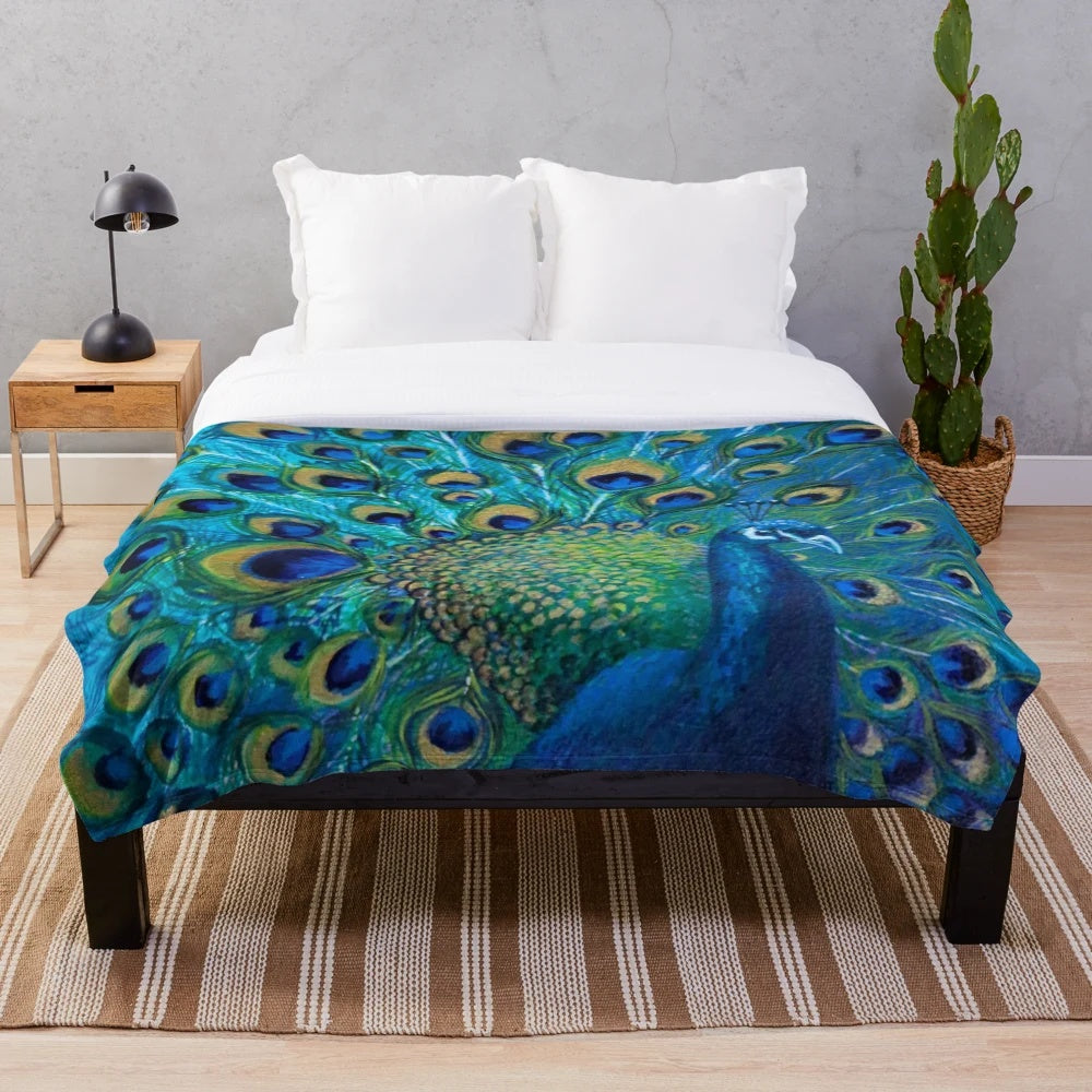 Plush peacock blanket with vibrant feather design