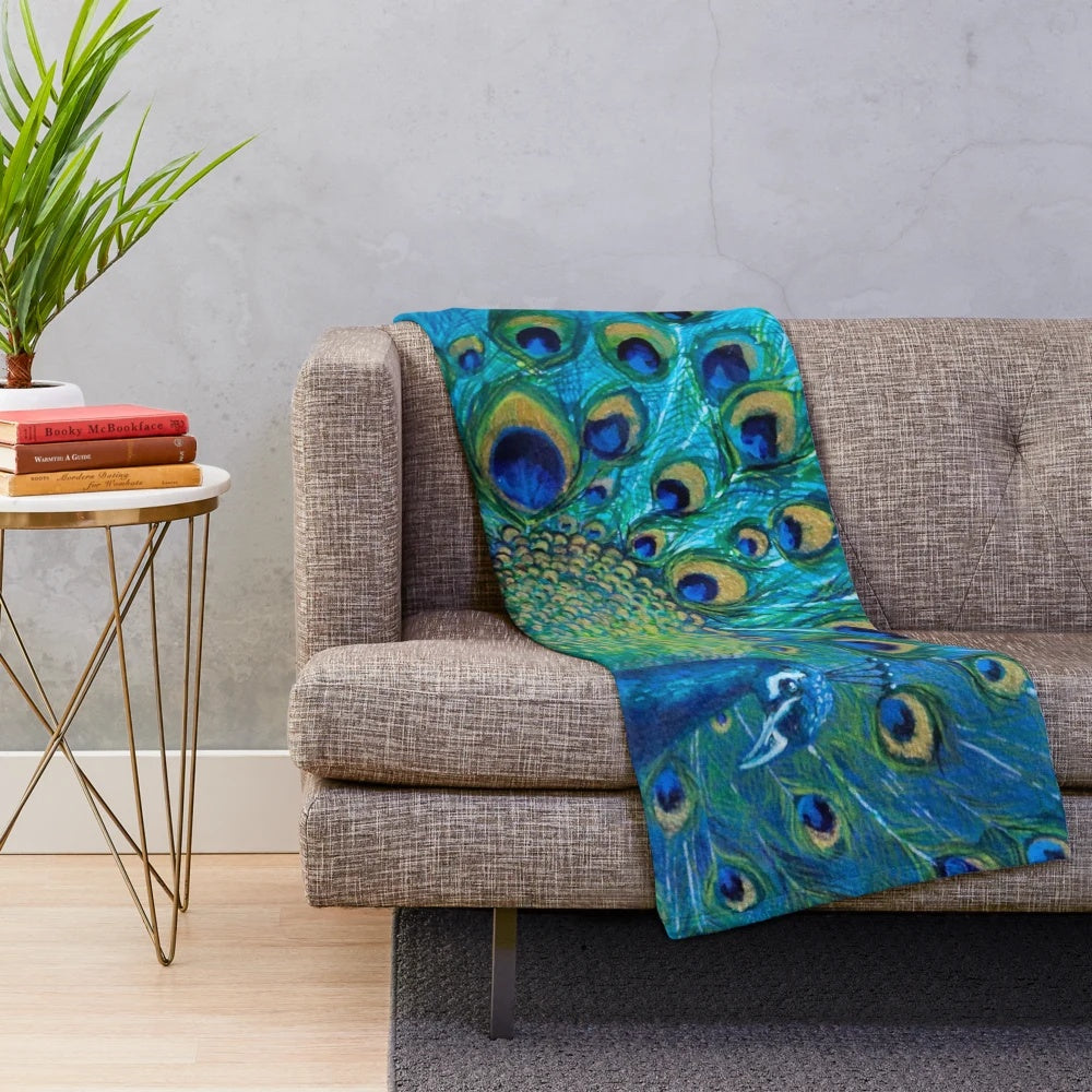 Plush peacock blanket with vibrant feather design