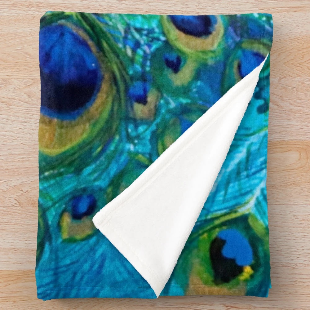 Plush peacock blanket with vibrant feather design