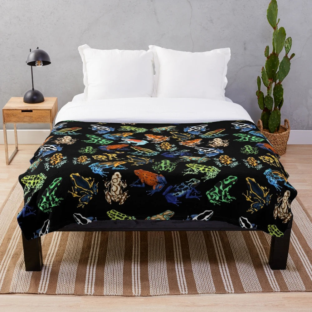 Soft, plush blanket featuring colorful poison dart frog design