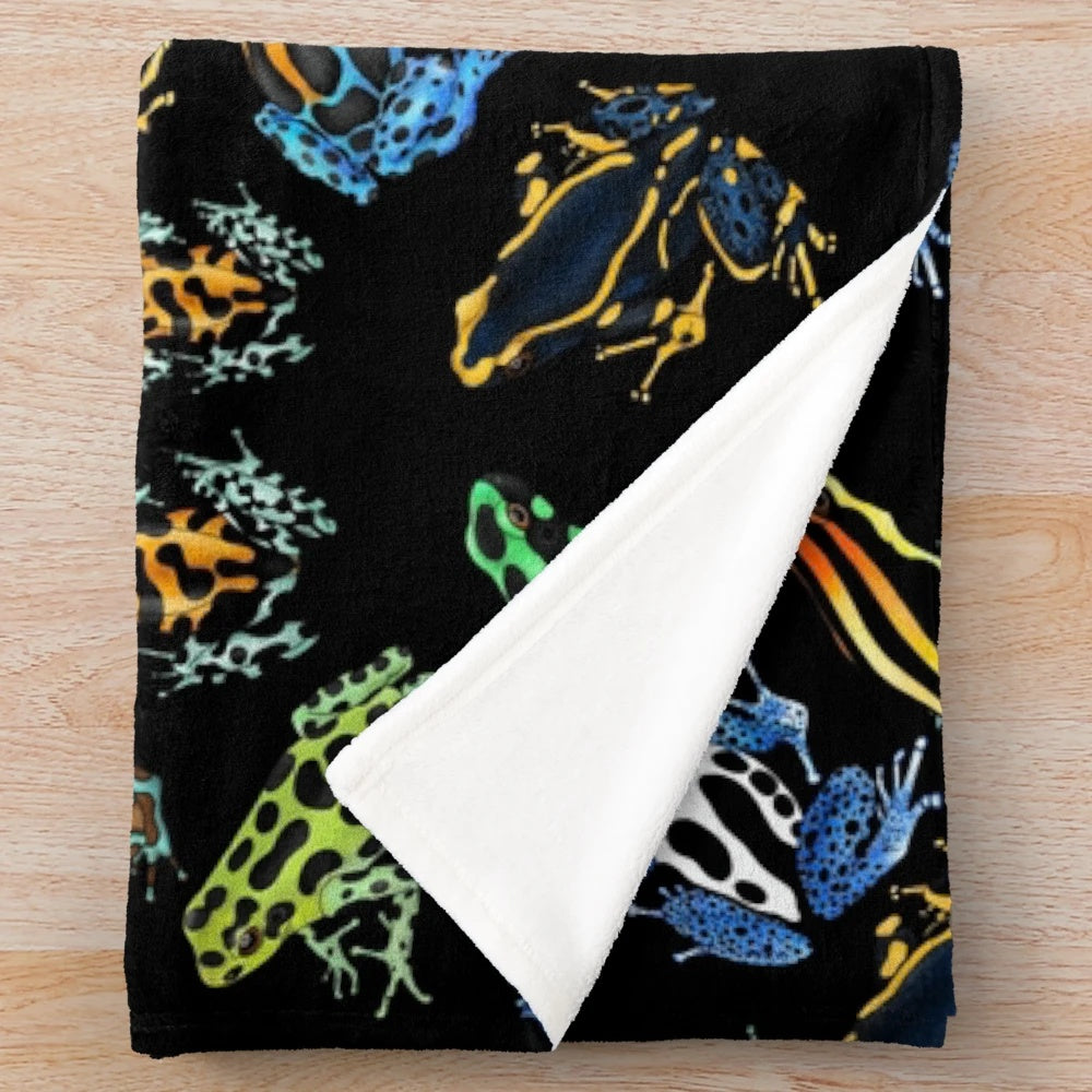 Soft, plush blanket featuring colorful poison dart frog design