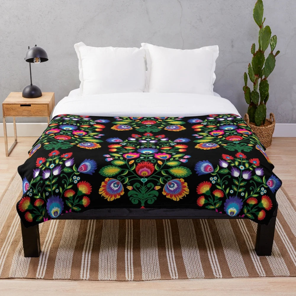 Handcrafted plush blanket featuring traditional Polish wycinanki folk art patterns