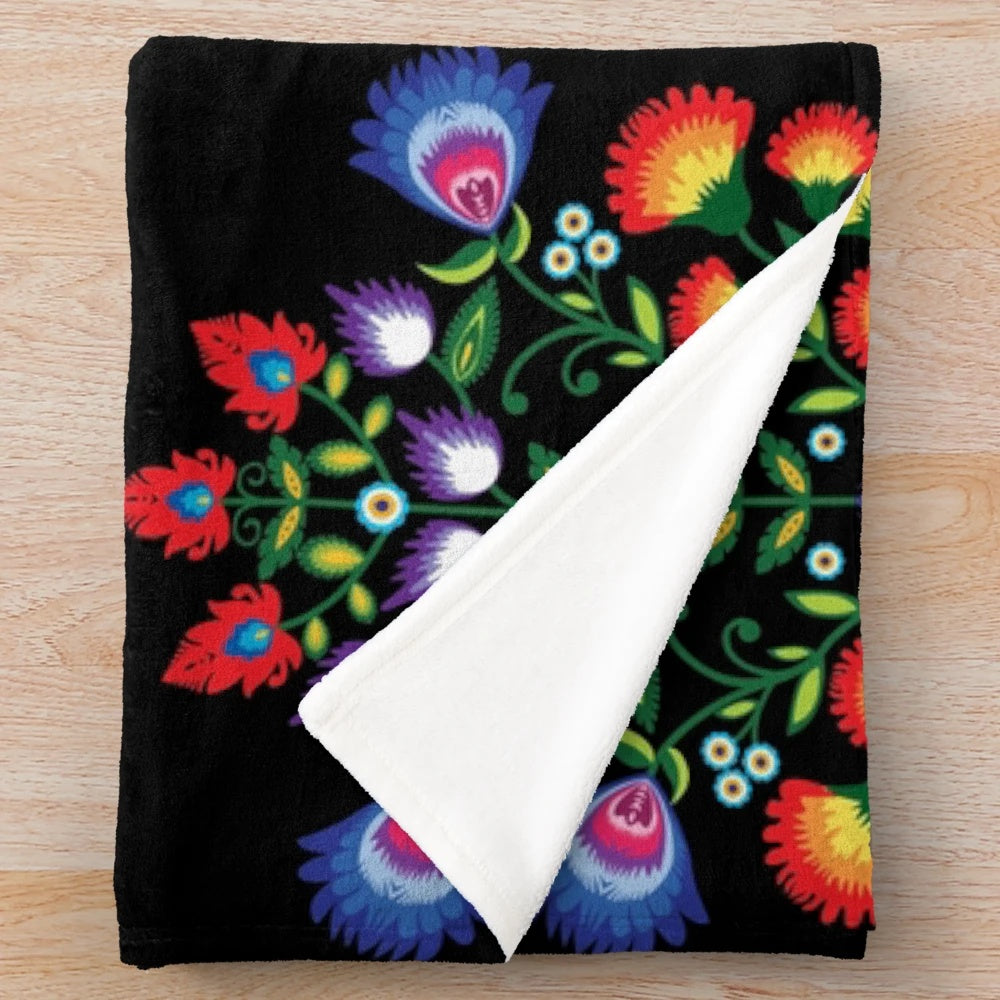 Handcrafted plush blanket featuring traditional Polish wycinanki folk art patterns