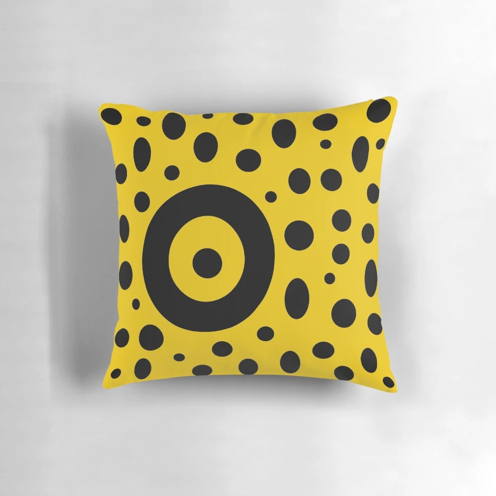 A vibrant pop art inspired geometric composition decorative pillow in yellow and black colors