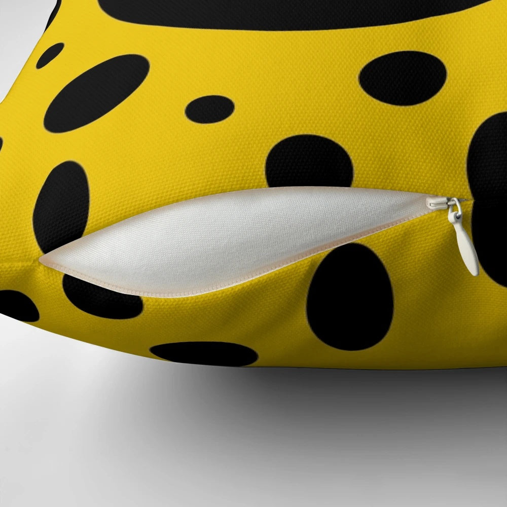 A vibrant pop art inspired geometric composition decorative pillow in yellow and black colors