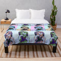 Colorful pop art-style portrait of actor Owen Wilson on a plush blanket