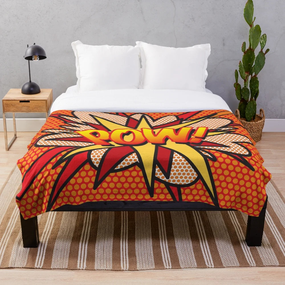 Colorful pop art style plush blanket featuring comic book graphics