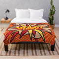 Colorful pop art style plush blanket featuring comic book graphics