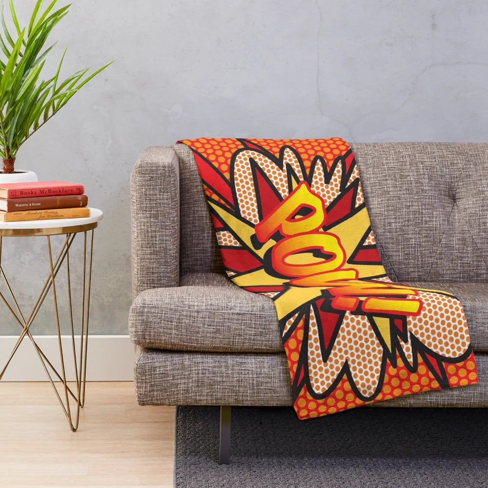 Colorful pop art style plush blanket featuring comic book graphics