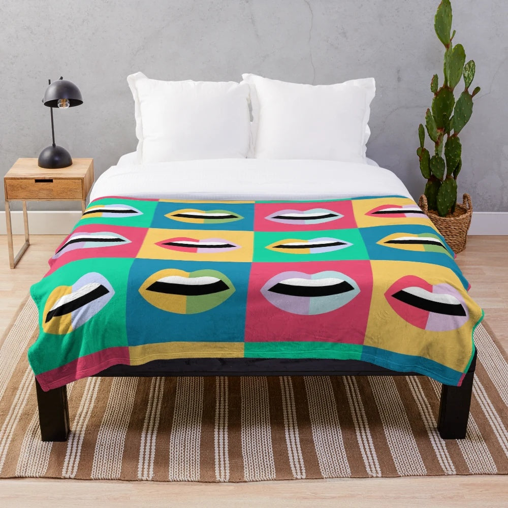 Colorful pop art style plush blanket featuring retro lips and mouth design