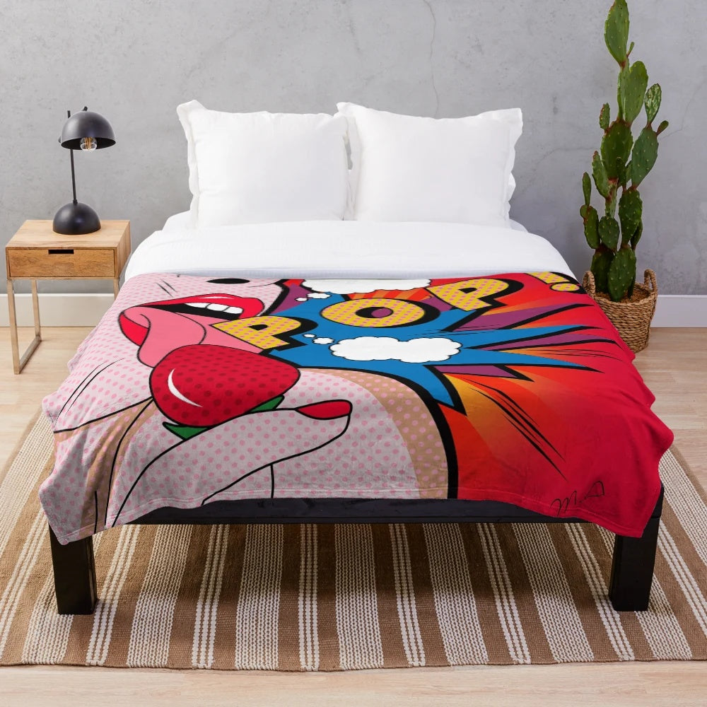 Colorful pop art inspired plush blanket with vibrant graphics