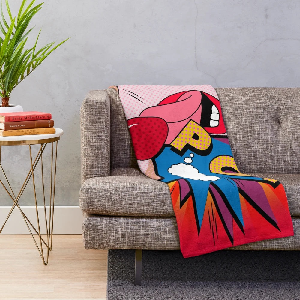 Colorful pop art inspired plush blanket with vibrant graphics