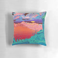 Vibrant pop art pillow featuring a colorful landscape with clouds, a moon, and desert rocks