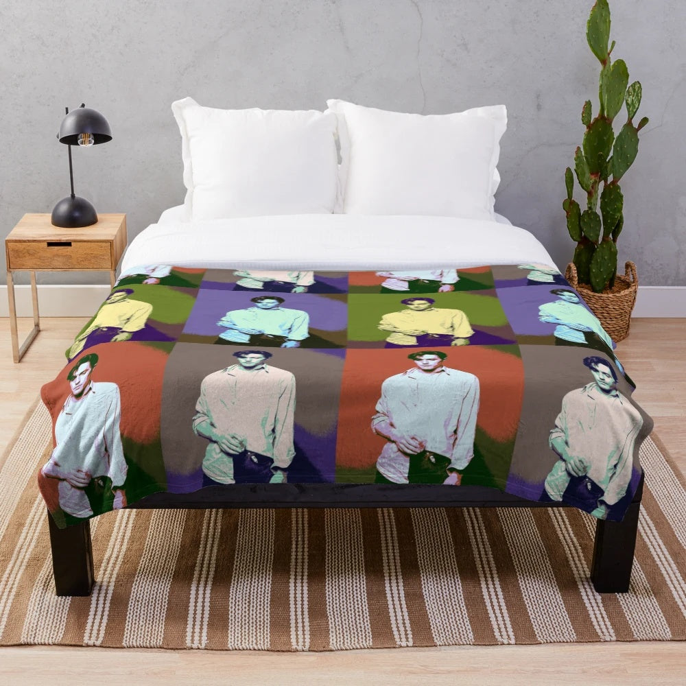 Colorful pop art plush blanket with a portrait of actor Hugh Grant