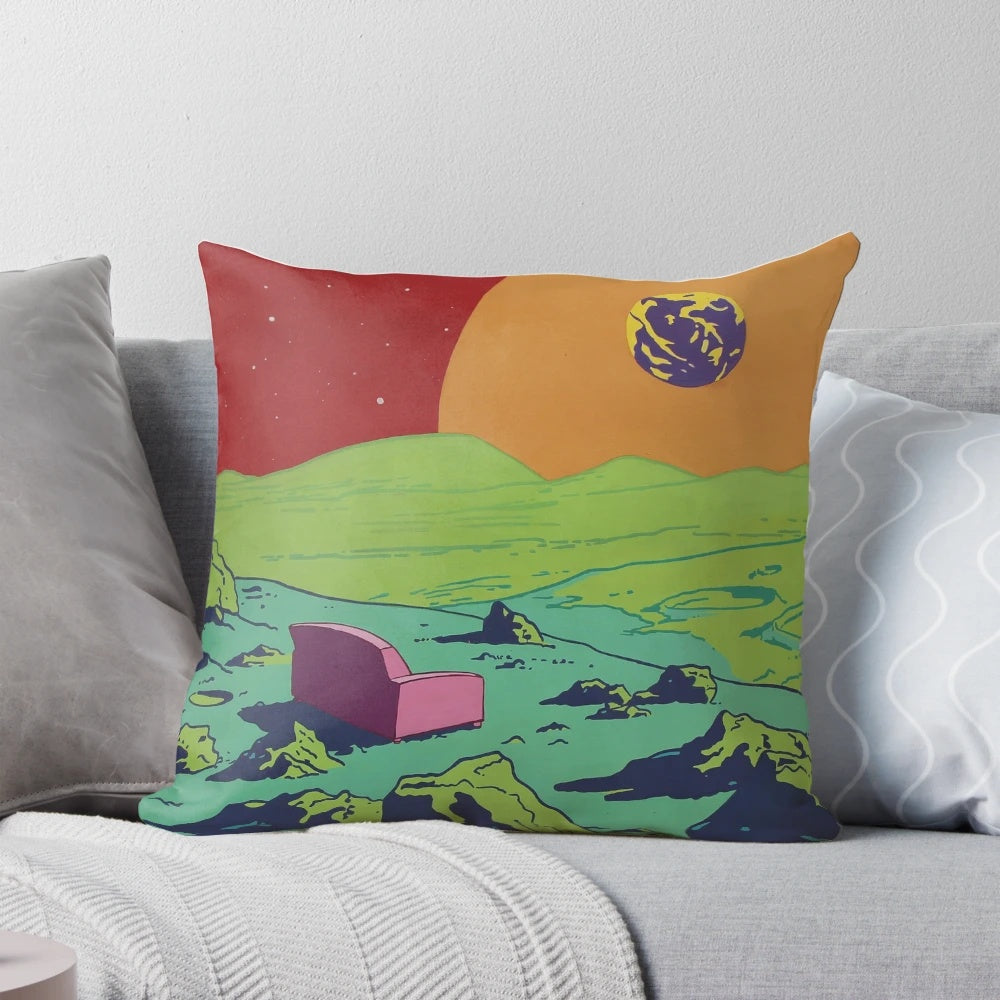 Colorful couch pillow with a cosmic galaxy design featuring the moon, planets, and stars