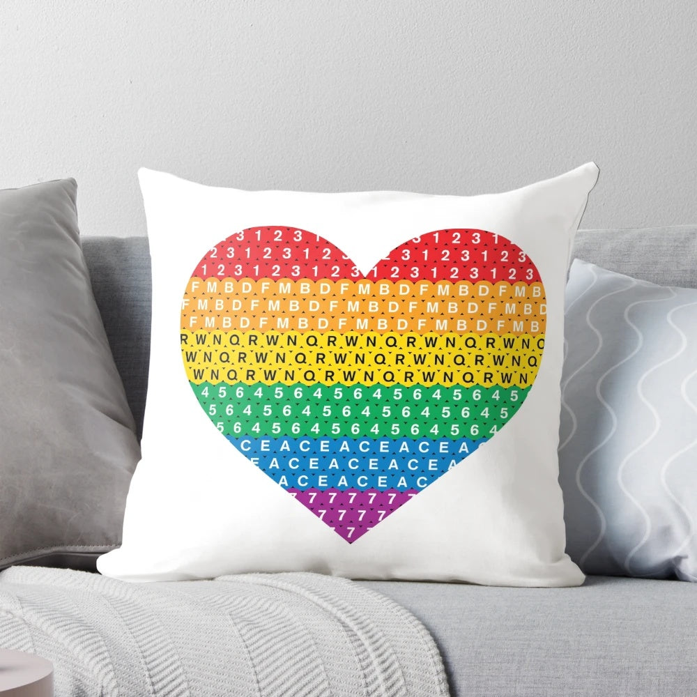 Colorful throw pillow with Pride flag design and heart shape, perfect for LGBTQ home decor