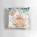 Colorful protea flower print on a soft, cushiony pillow for botanical-inspired home decor.