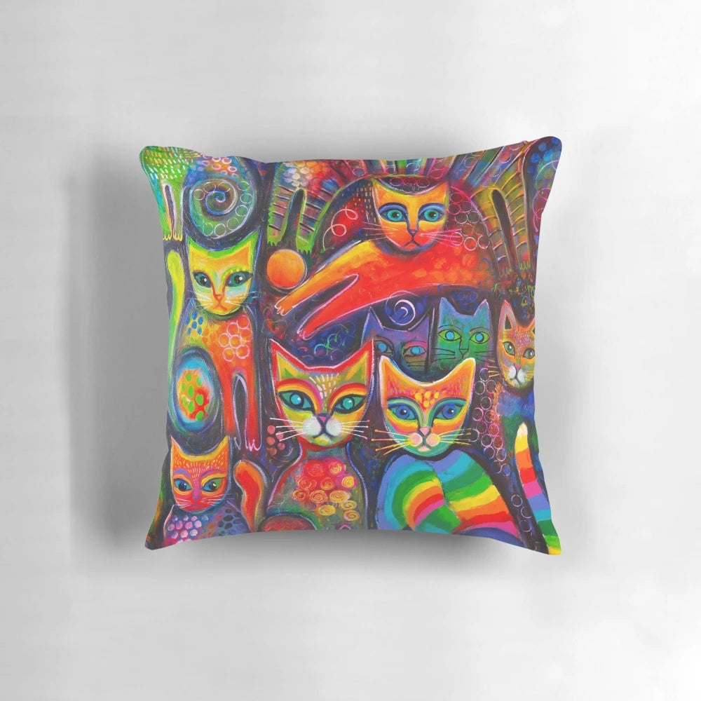 Colorful, psychedelic-inspired illustration of whimsical cats on a decorative pillow