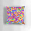 Colorful psychedelic flower design pillow with retro 1970s style swirls and stripes
