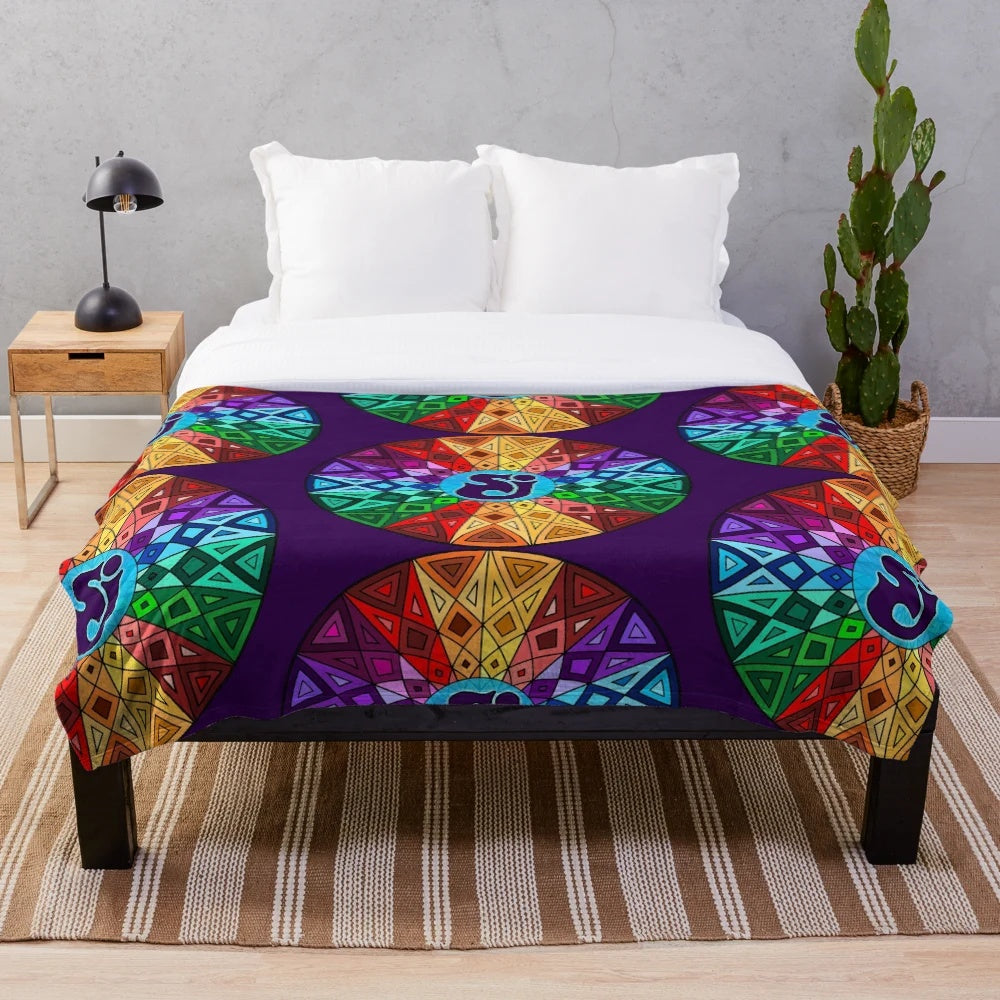 Colorful psychedelic geometric mandala plush blanket with vibrant tie-dye pattern