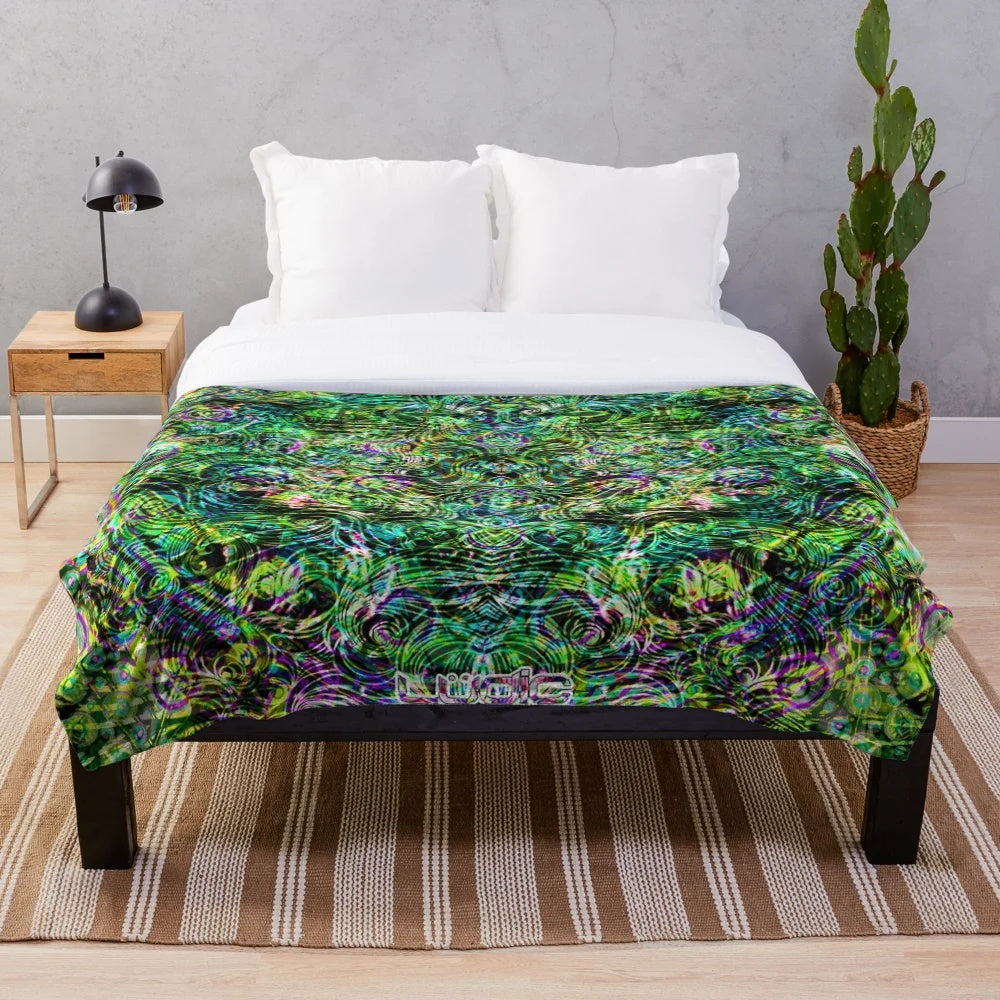 Colorful psychedelic plush blanket with abstract design