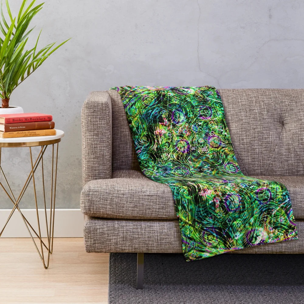 Colorful psychedelic plush blanket with abstract design
