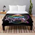 Colorful psychedelic plush blanket with abstract, kaleidoscopic patterns