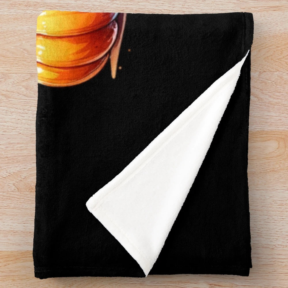 Cozy plush blanket featuring a whimsical watercolor pumpkin illustration in fall colors