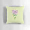 A plush throw pillow featuring a vibrant purple abstract bubble flower design, perfect for spring home decor.