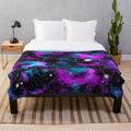Purple and blue galaxy plush blanket
