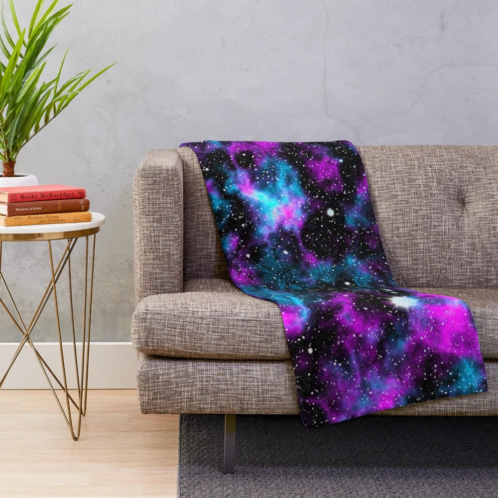 Purple and blue galaxy plush blanket