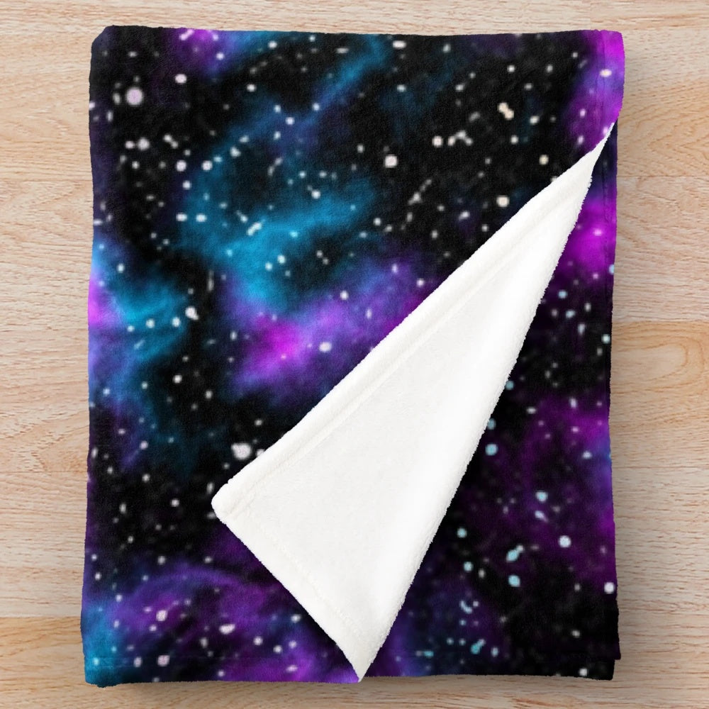 Purple and blue galaxy plush blanket