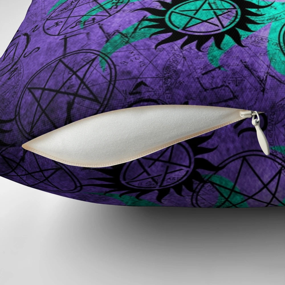 A set of three decorative pillows in vibrant purple and teal colors.