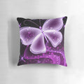 A colorful pillow featuring a beautiful purple butterfly design