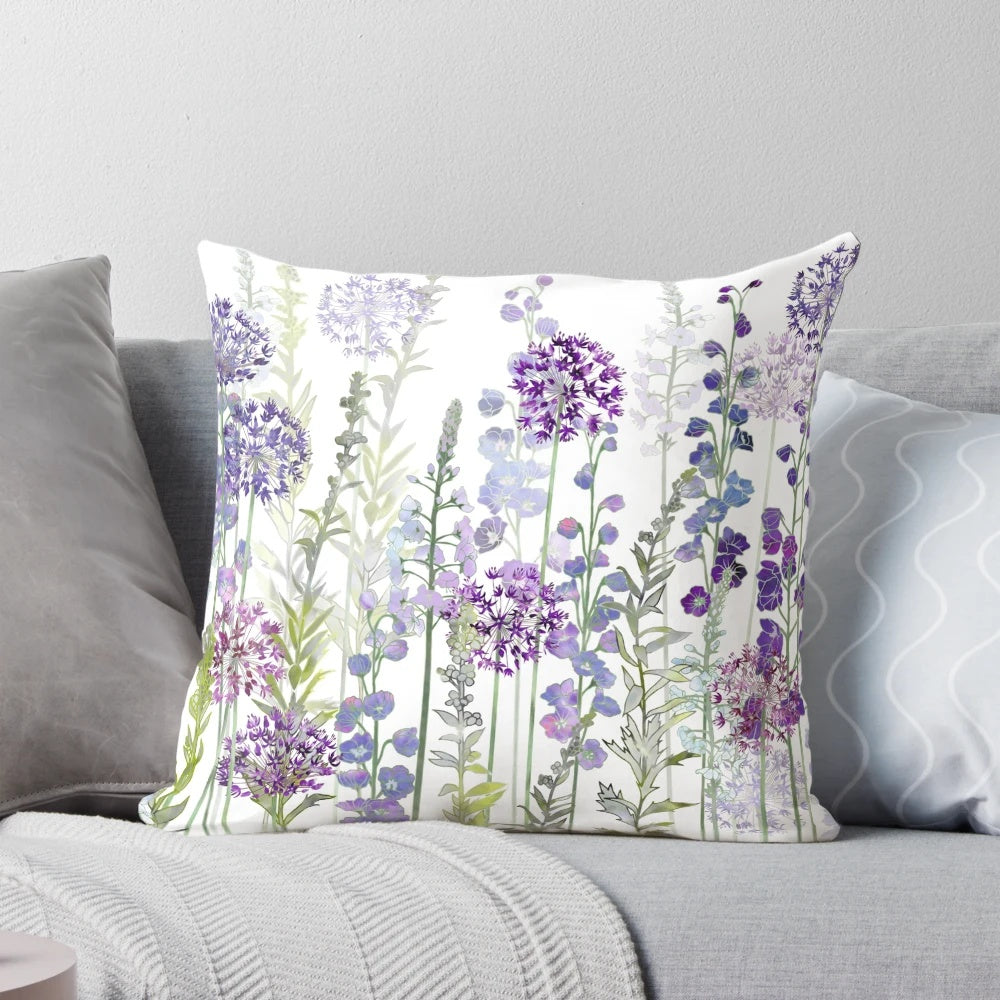 Vibrant purple flower meadow pillow featuring alliums, delphiniums, and veronica gentianoides