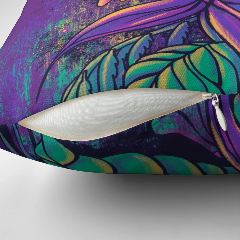 Colorful purple pillow with artistic design featuring hummingbirds and botanical flowers