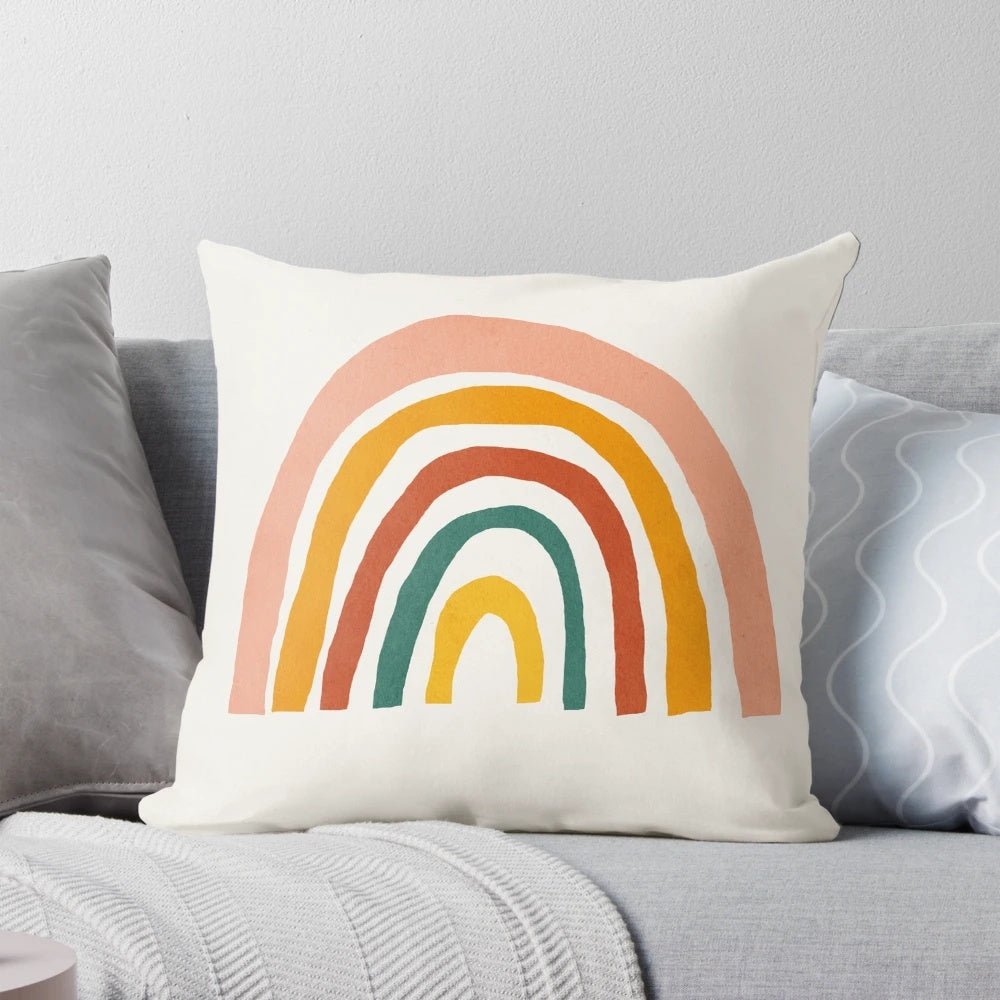 Colorful rainbow-patterned abstract mid century modern style wall art pillow for kids' nursery or bedroom