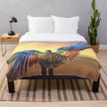 Colorful plush blanket featuring an angel with rainbow wings, inspired by Supernatural