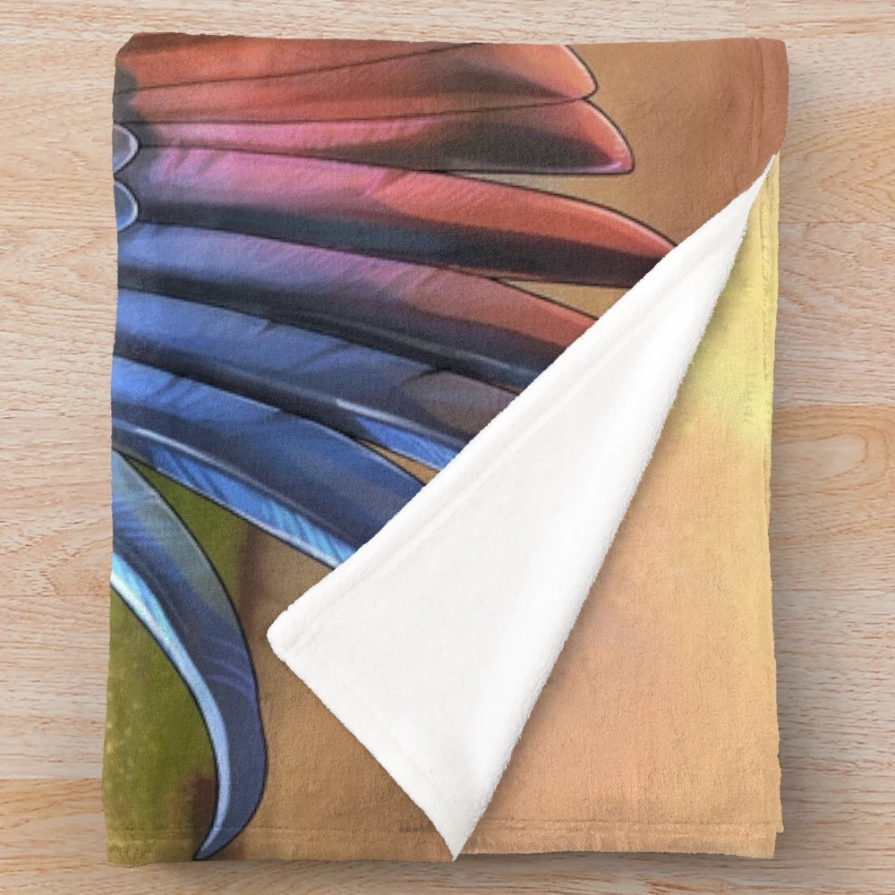 Colorful plush blanket featuring an angel with rainbow wings, inspired by Supernatural