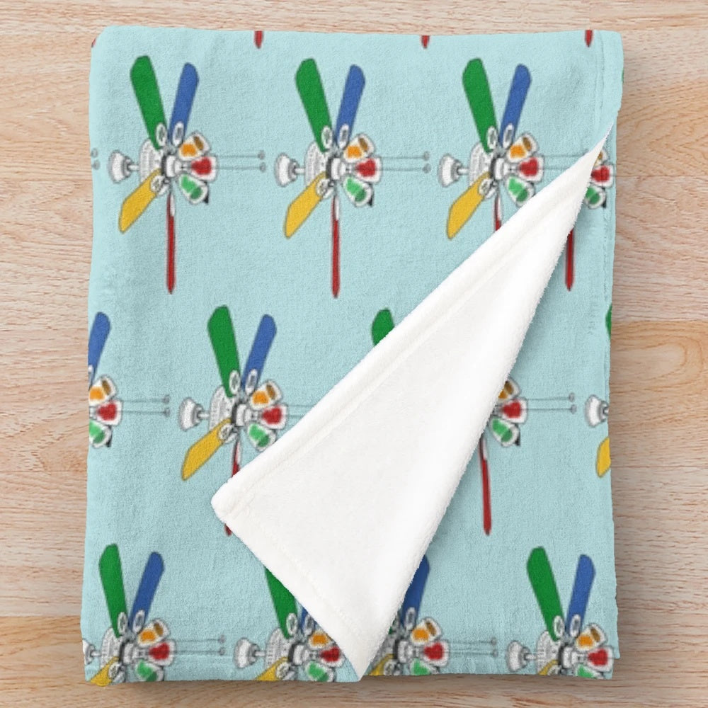 Colorful rainbow plush blanket with ceiling fan design, perfect for autism-friendly home decor
