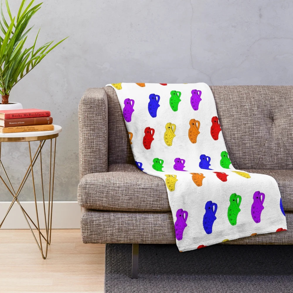 Colorful rainbow plush blanket with crocs-inspired pattern