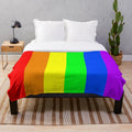 Plush throw blanket in the colors of the rainbow pride flag
