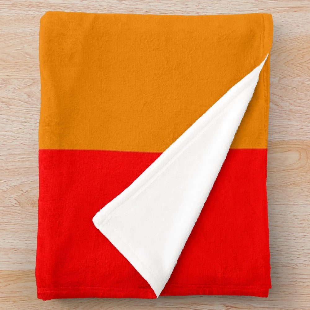 Plush throw blanket in the colors of the rainbow pride flag
