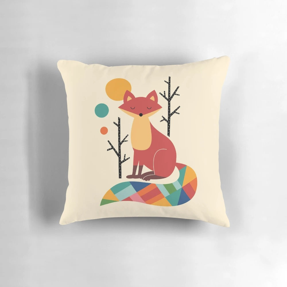 A colorful and whimsical pillow featuring a rainbow-hued fox in a lush, forest landscape.