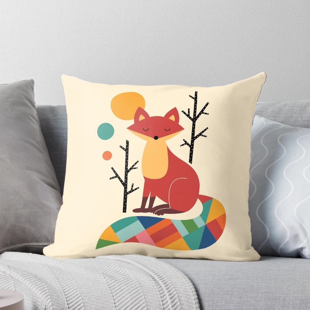 A colorful and whimsical pillow featuring a rainbow-hued fox in a lush, forest landscape.