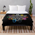 Colorful rainbow-themed plush blanket with abstract energy type symbols