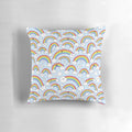 Colorful and whimsical rainbow-themed pillow with kawaii cloud doodles